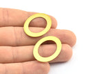 Middle Hole Connector, 25 Raw Brass Oval And Middle Hole Connector (23x32mm) Brs 600 A0539
