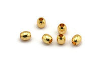 8 Gold Plated Brass Oval Industrial Findings, Spacer Beads (6x5 Mm) D0024