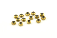 Brass Bead Keeper, 12 Raw Brass Bead Keeper, Silicone And Brass, Rondelle (5.5x3mm) D1223